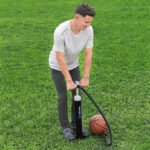 Bestway Air Hammer Sport 62227 inflating a basketball on grass