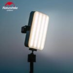 Naturehike Moonlight Plus camping lamp mounted on a tripod