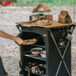 Naturehike NH22JU015 folding camp kitchen shelf - bamboo top in use as a prep surface