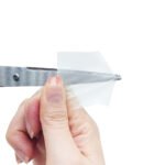 Clear TPU repair tape film held to show its transparency