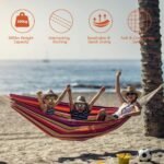 Striped canvas hammock - in use on the beach