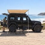 Car Awning with Aluminum Hard Case – 200x250cm Heavy-Duty Side Awning for 4×4 & SUV - illustrative image, scene generated