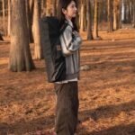 Carrying the Naturehike CNH22JU038 folding table in its shoulder bag