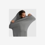 Naturehike high-elasticity sleeping bag liner - stretch fabric pulled to show the elasticity