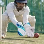 SG RSD Xtreme Wicket Keeping Gloves – PVC Palm with Rubber Grip - illustrative image, scene generated