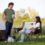 CORE Padded Love Seat 40426 - two people seated outdoors