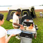 CORE FlexRail Cook Table in use at a campsite