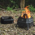 CARGO CONTAINER Fire Pit Max beside its padded carry bag